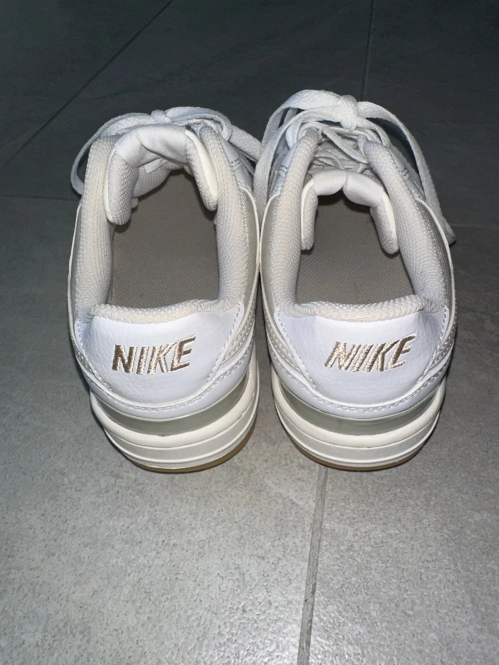 Nike White Sneakers with Cream Swoosh and Gum Outsole